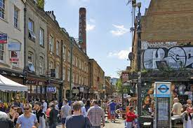 Brick Lane in Eat London filled with people on the street